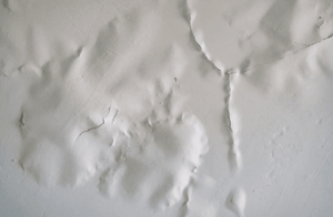 An image of water damage causing ceiling sag